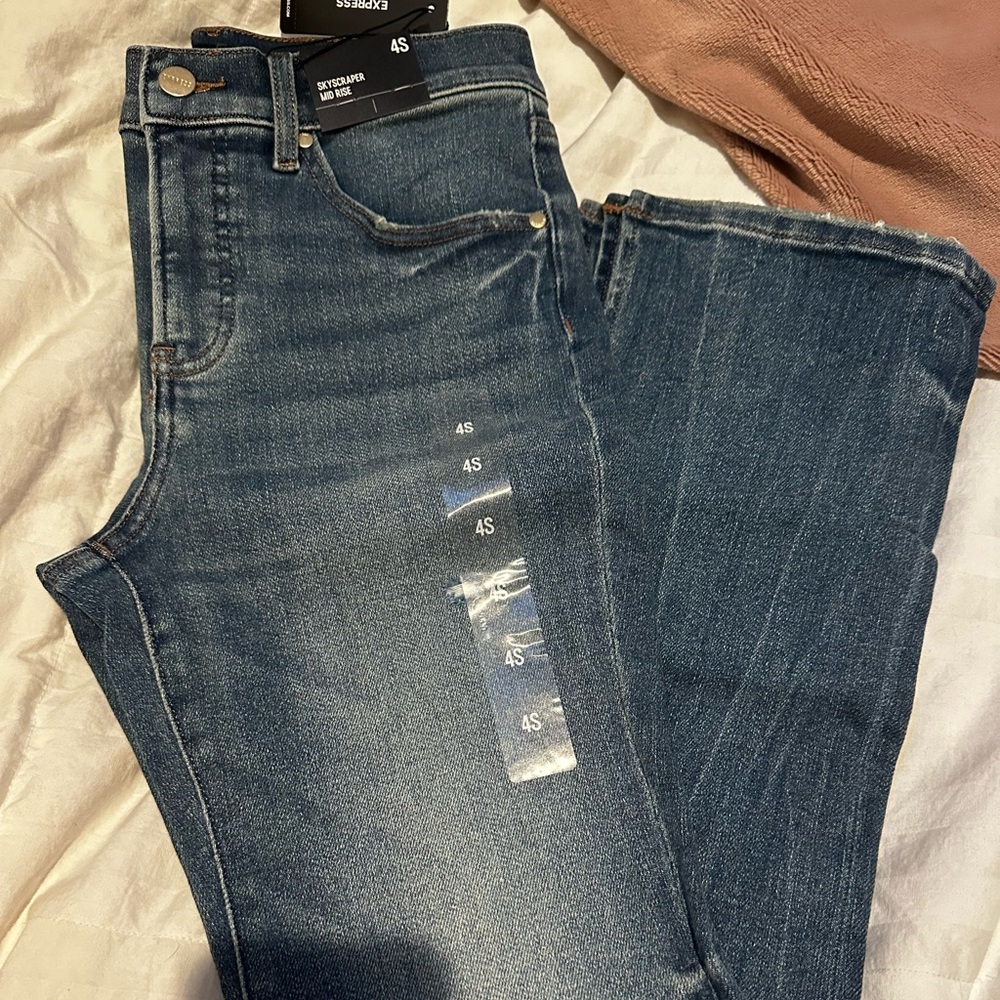 Express skyscraper mid rise jeans